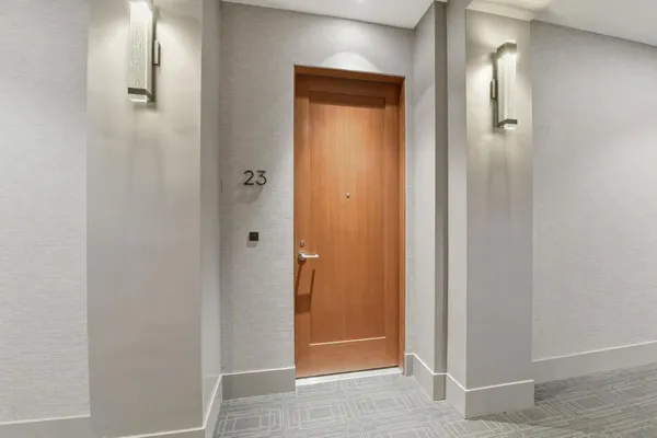 a view of a hallway with closet area