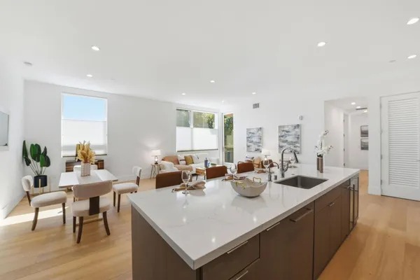 a kitchen with a stove and cabinets