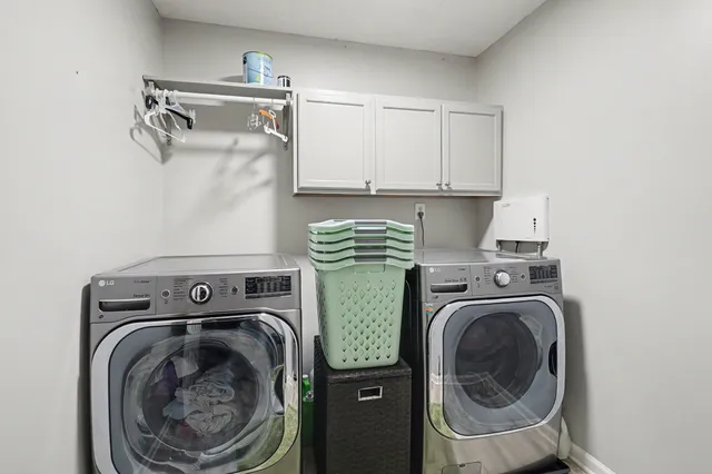 a view of a chairs and table in the balcony