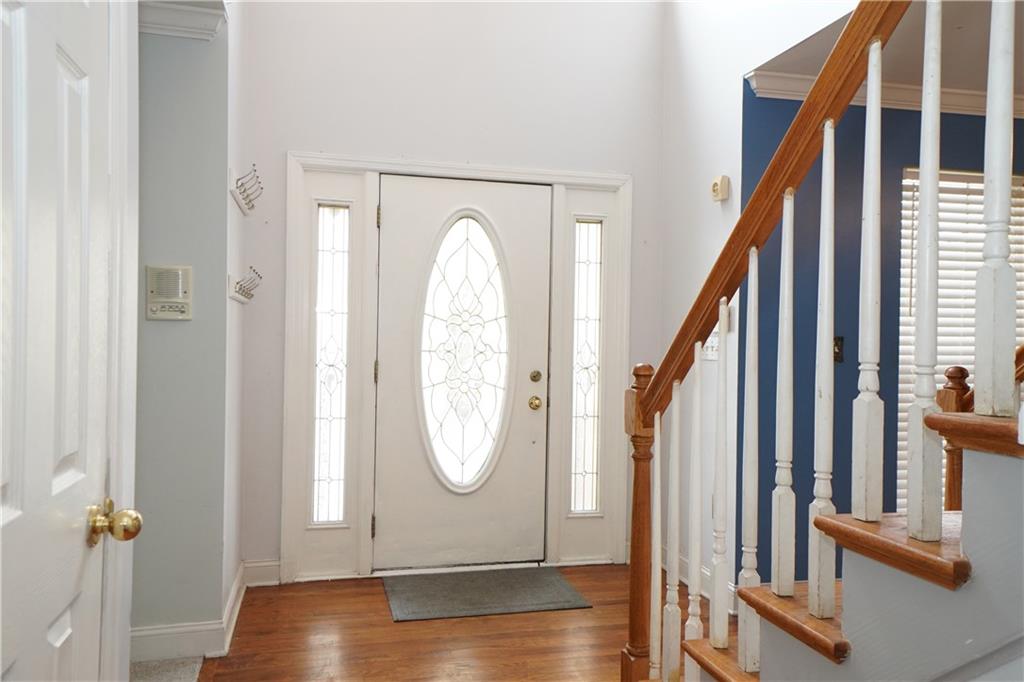 728 Mercer Street Pittsburgh, PA 15219 - Photo 3 of 27 a view of an entryway with wooden floor