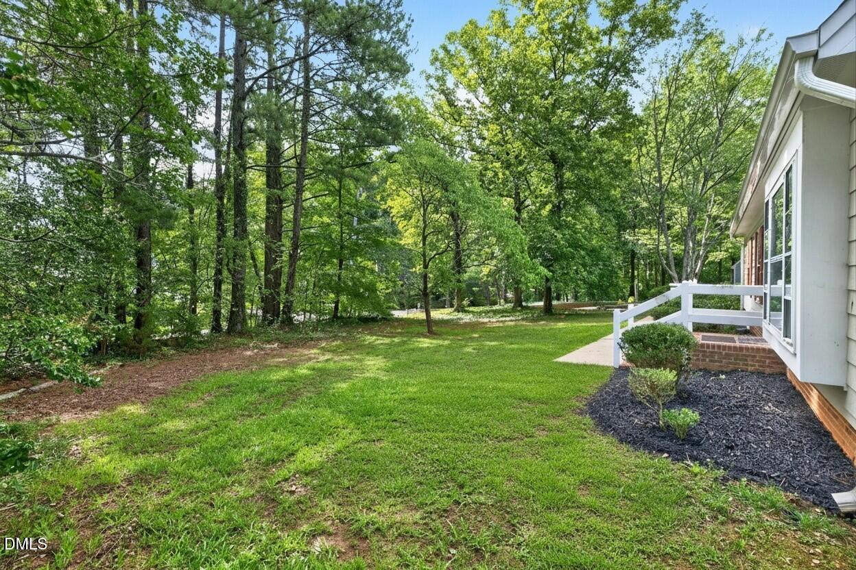 708 Powell Drive, Unit A Raleigh, NC 27606 - Photo 16 of 20 Side front yard.
