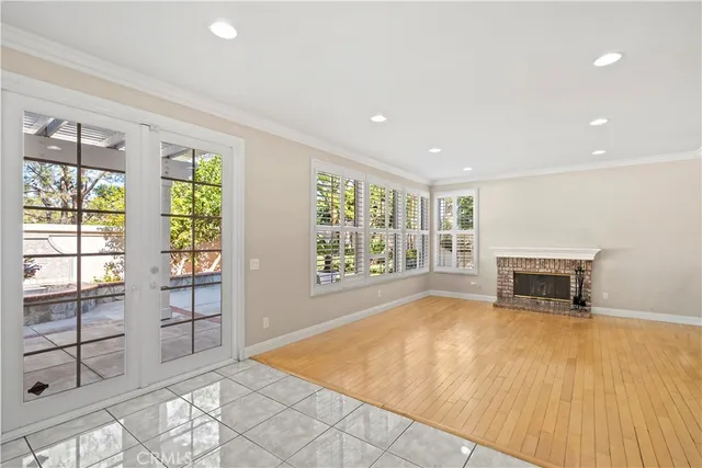 a view of a patio with a table and chairs