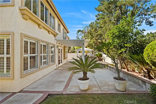 a view of a backyard of the house