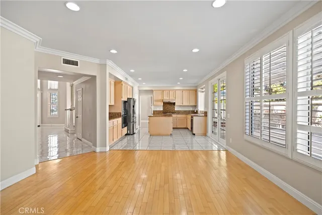 a view of a bathroom with shower and windows