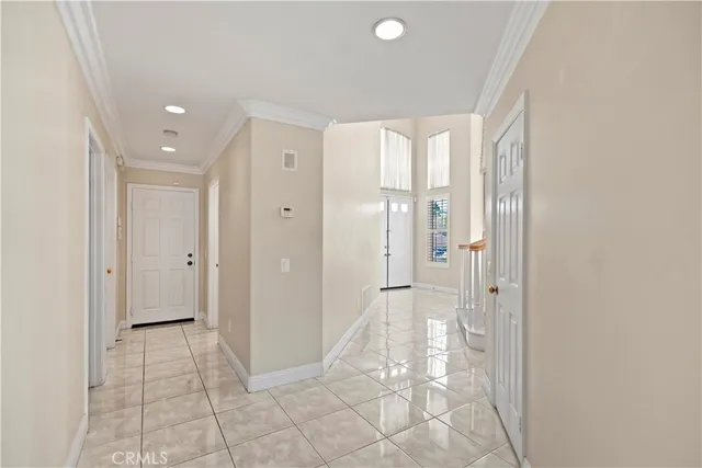 a bathroom with a granite countertop toilet a sink and a mirror