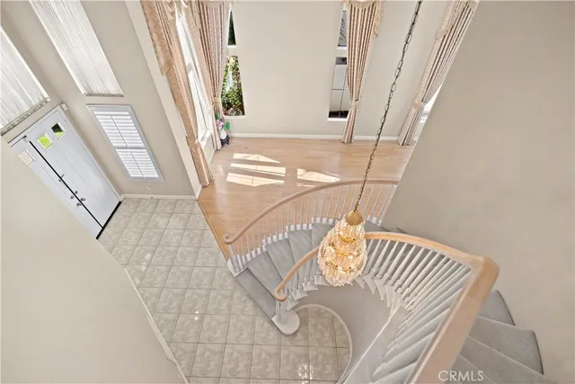 a view of a hallway with wooden shelves