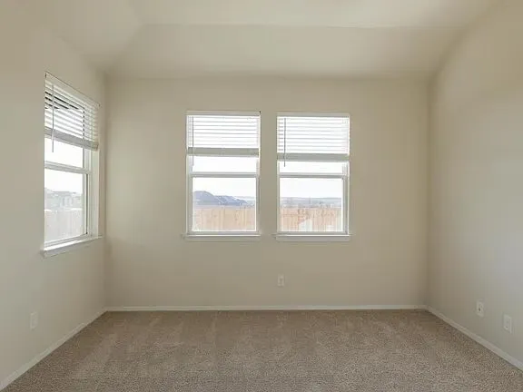a kitchen with stainless steel appliances kitchen island a stove a sink and a microwave