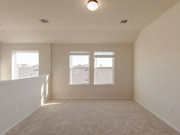 a bathroom with a granite countertop sink a toilet and a mirror
