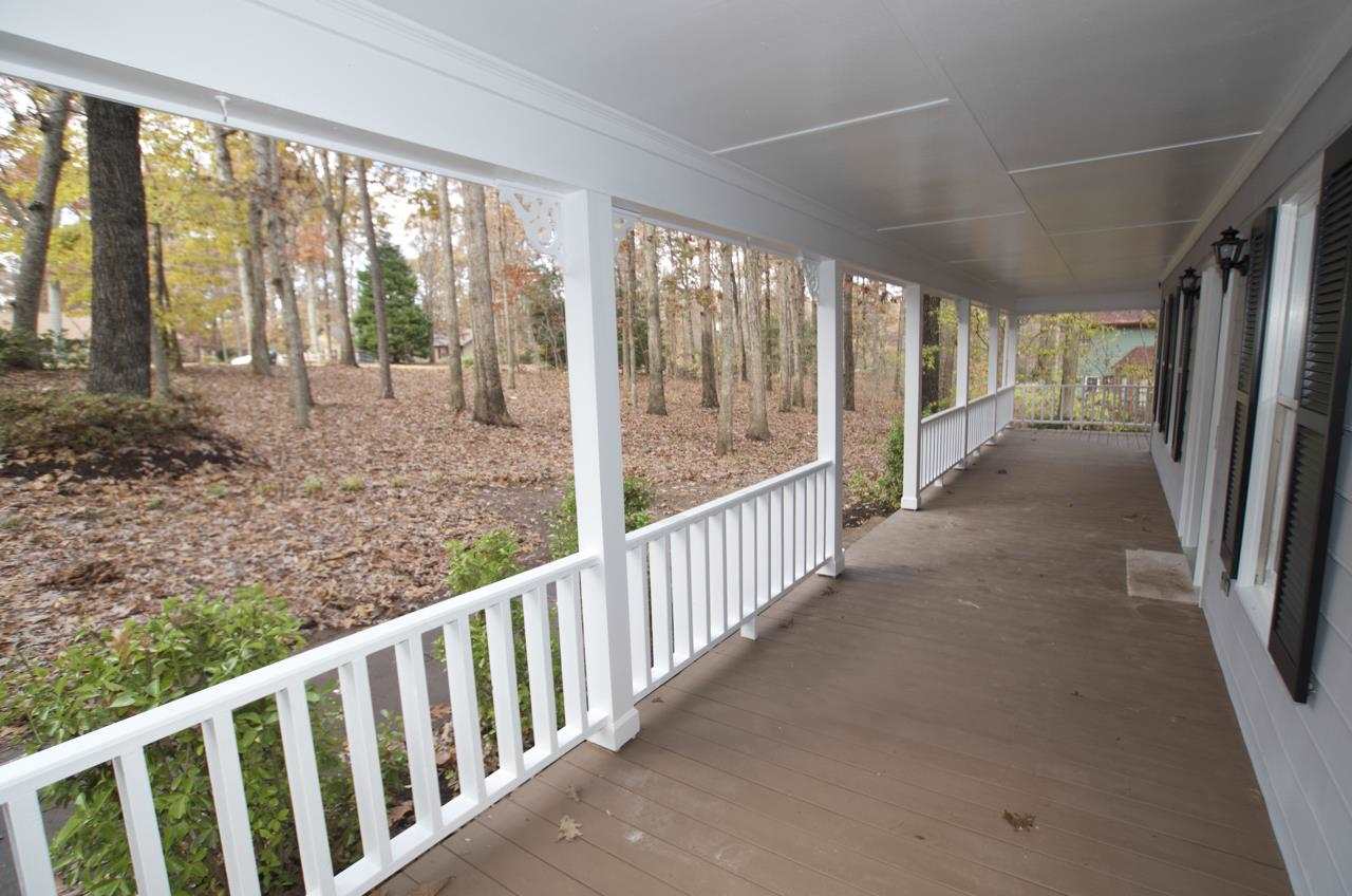 5213 Penny Road Raleigh, NC 27606 - Photo 22 of 24 Huge wrap around porch. Perfect for a bunch of rocking chairs.