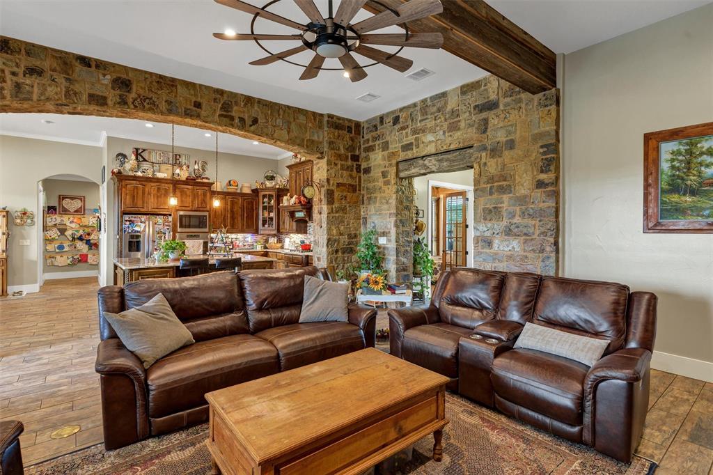 1000 Billings Road Tolar, TX 76476 - Photo 11 of 40 a living room with furniture and a large window