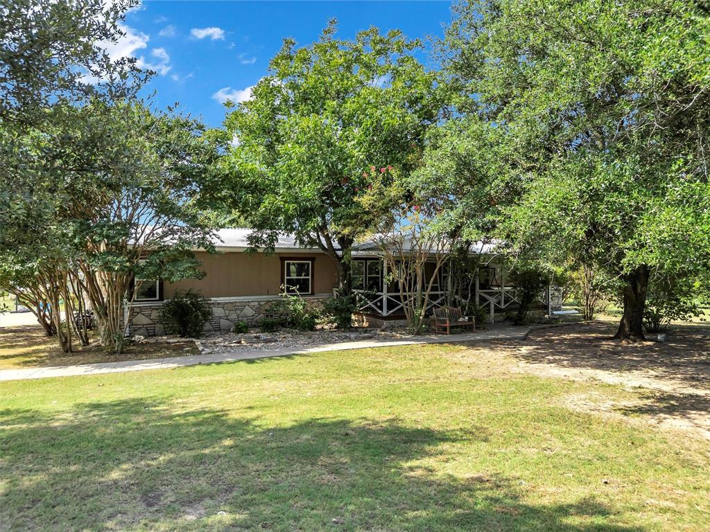 1000 Billings Road Tolar, TX 76476 - Photo 38 of 40 a view of a house with a yard