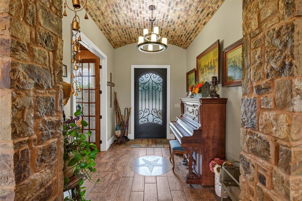 1000 Billings Road Tolar, TX 76476 - Photo 8 of 40 a view of an entryway with wooden floor