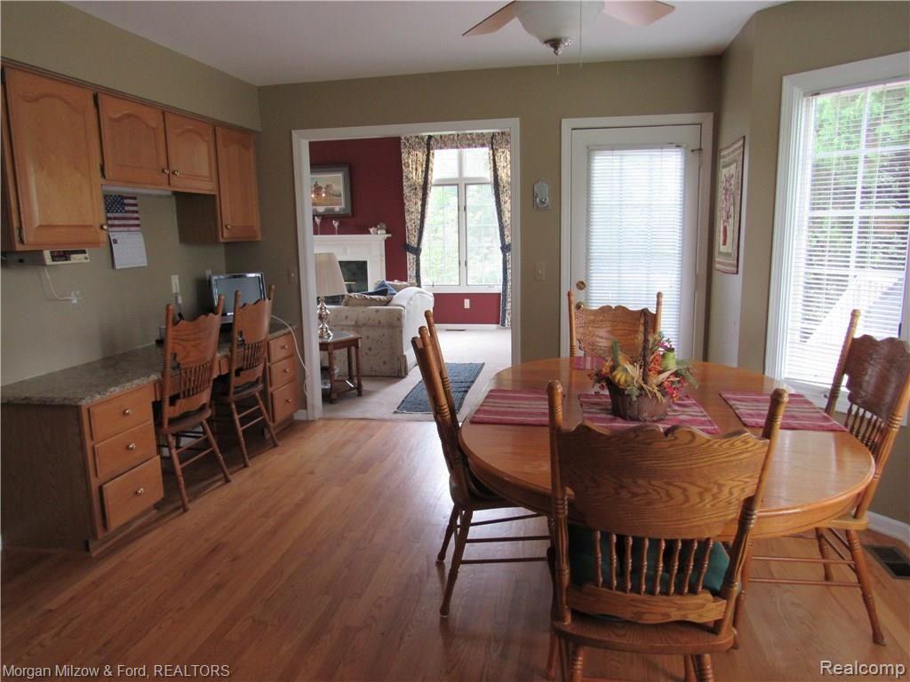 5476 Ridge Trail North Clarkston, MI 48348 - Photo 8 of 47 Spacious Breakfast room with bay window, door to deck