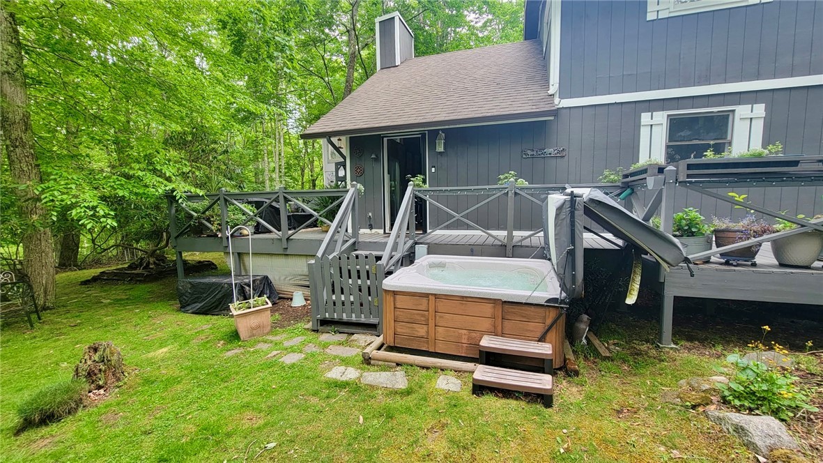 111 Locust Ridge Road Beech Mountain, NC 28604 - Photo 18 of 21 a view of a backyard with chairs and a slide