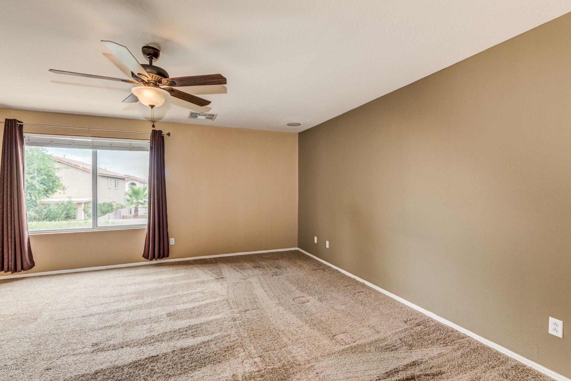 15770 West Calavar Road Surprise, AZ 85379 - Photo 11 of 21 Master Bedroom
