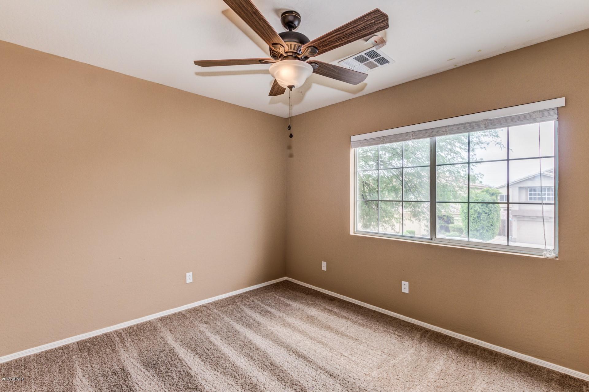 15770 West Calavar Road Surprise, AZ 85379 - Photo 16 of 21 Bedroom 2