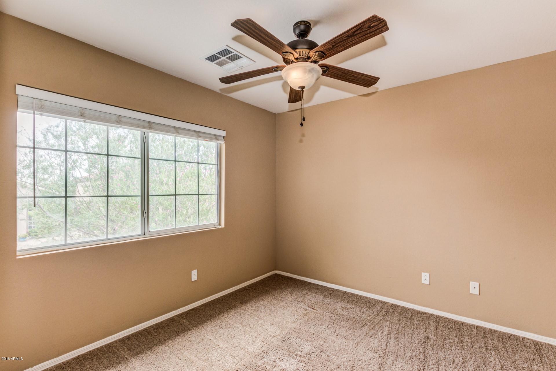 15770 West Calavar Road Surprise, AZ 85379 - Photo 17 of 21 Bedroom 3
