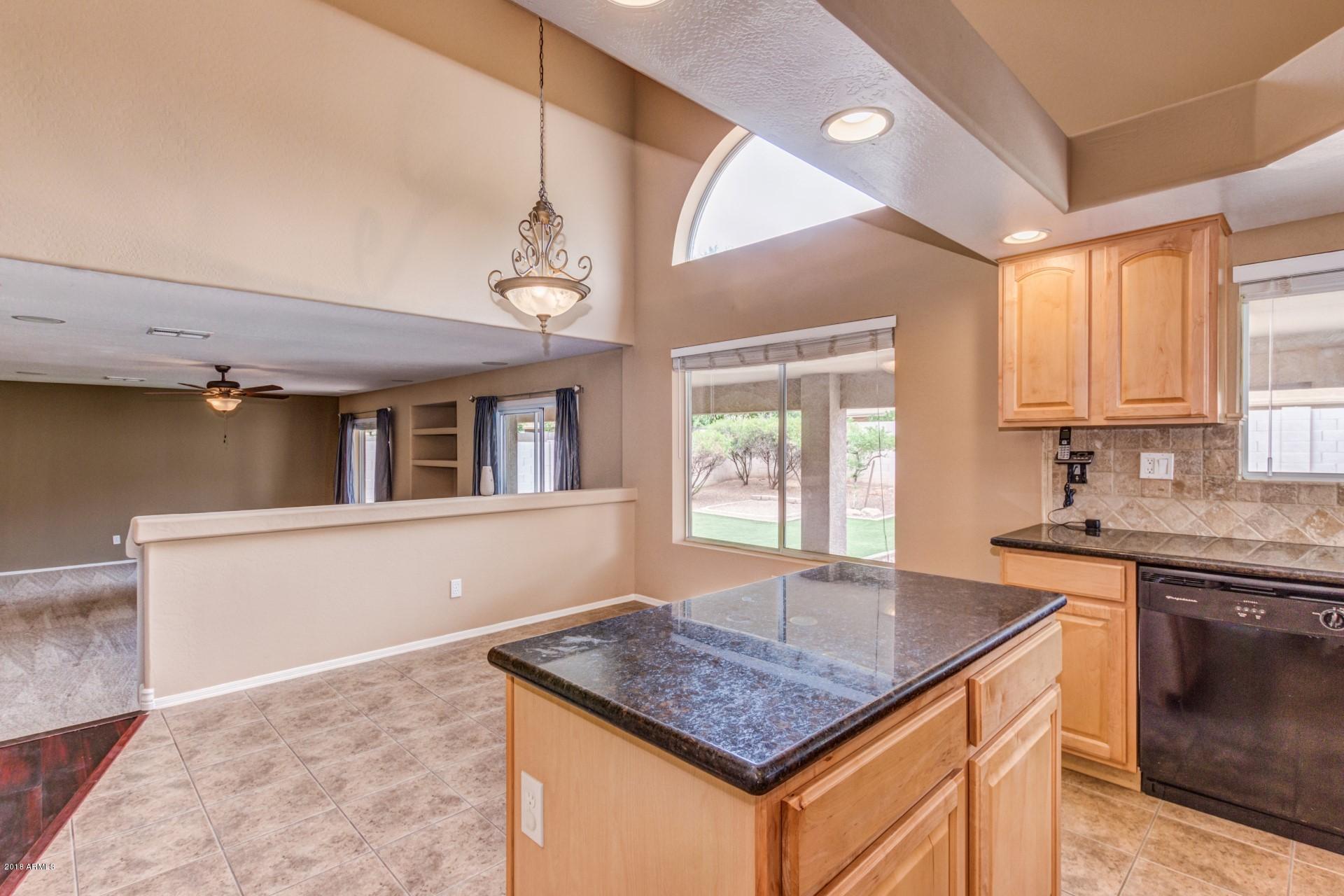 15770 West Calavar Road Surprise, AZ 85379 - Photo 8 of 21 Kitchen w/Granite and Breakfast Nook
