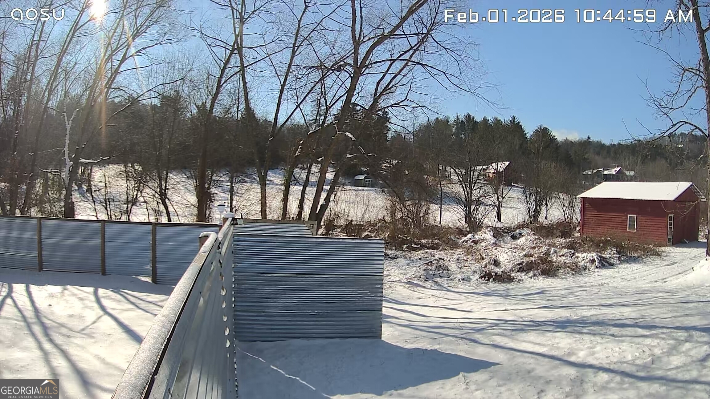 2731 Tate Road Blairsville, GA 30512 - Photo 2 of 4 a view of a yard and trees in the background