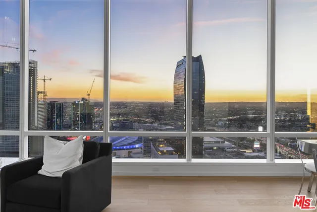 a view of a patio with swimming pool