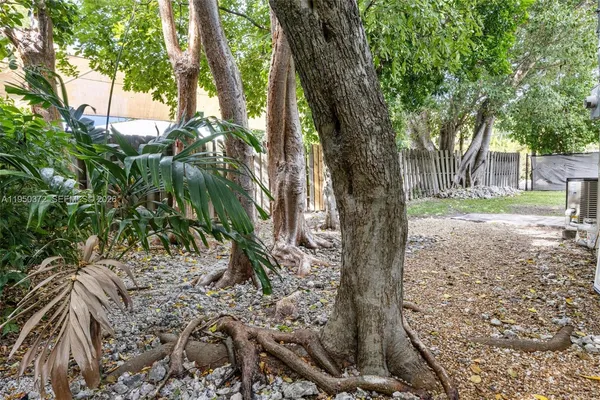 a view of backyard with green space