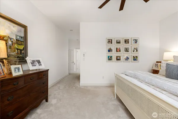a spacious bathroom with a double vanity sink and a mirror