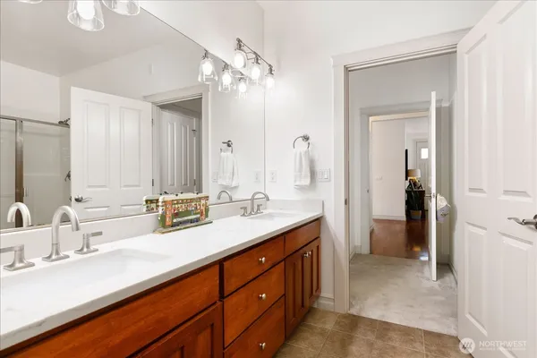a view of an entryway with wooden floor