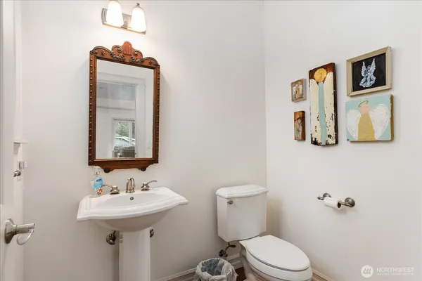 a view of a living room and hardwood floor