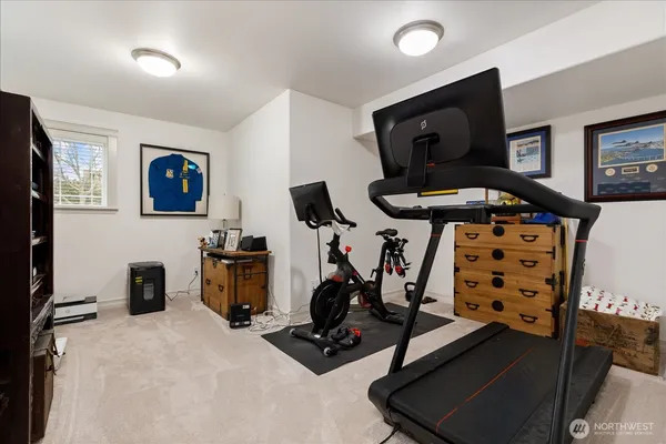 a view of workspace with a bookshelf