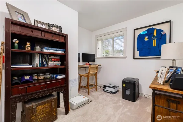 a room with furniture a washer and dryer