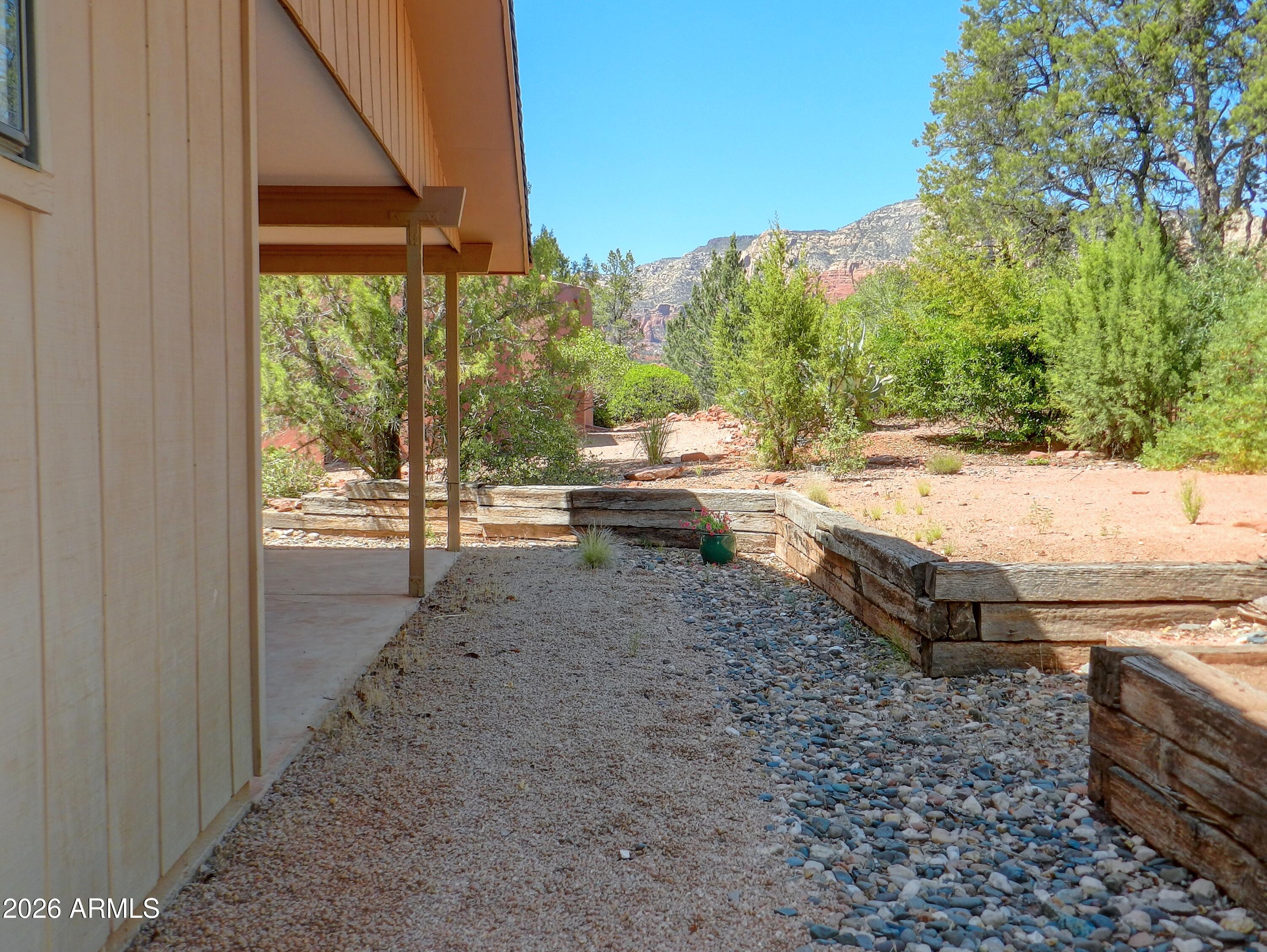 550 Barcelona Road Sedona, AZ 86336 - Photo 27 of 32 a view of a yard and patio