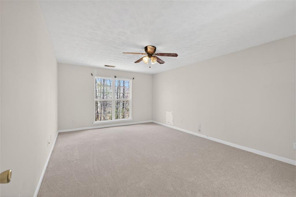 775 Sterling Place Monroe, GA 30656 - Photo 15 of 37 a view of an empty room with a window