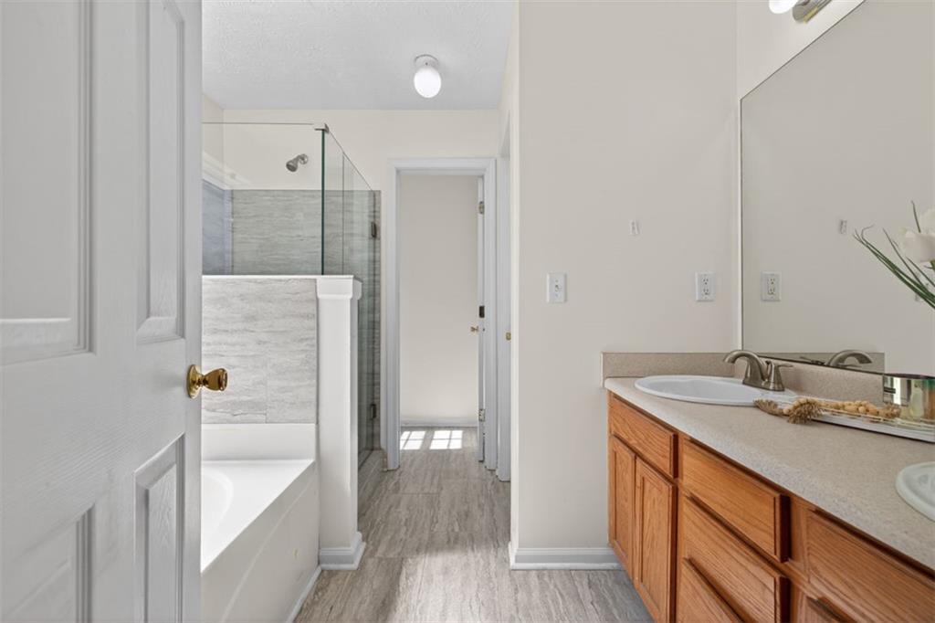 775 Sterling Place Monroe, GA 30656 - Photo 20 of 37 a bathroom with a sink a toilet and shower