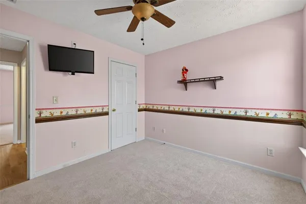 a view of a livingroom with a flat screen tv