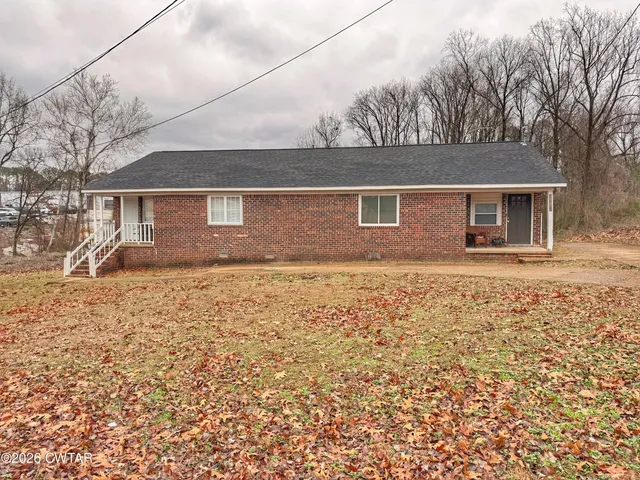 front view of house with a yard
