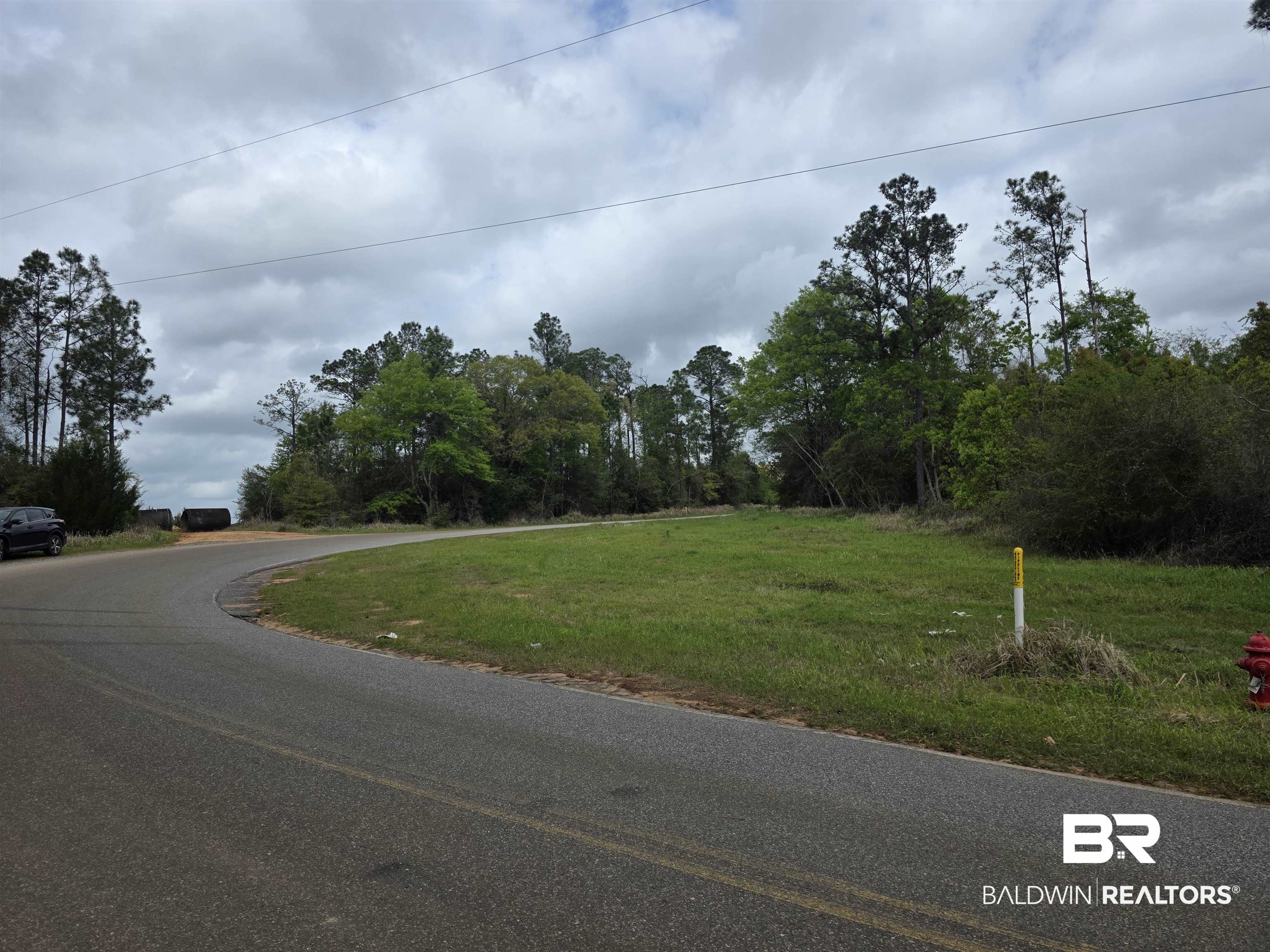 11631 Red Hill Rd Extension Bay Minette, AL 36507 - Photo 12 of 18 View of asphalt road