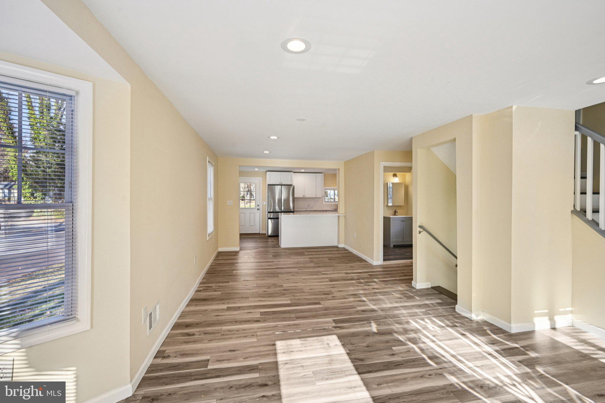 195 Chews Landing Road Clementon, NJ 08021 - Photo 8 of 48 a view of a hallway with wooden floor and windows