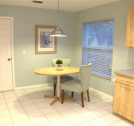 a kitchen with sink cabinets and window