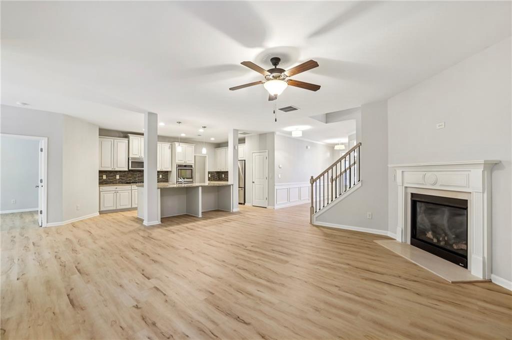 1210 Roswell Manor Circle Roswell, GA 30076 - Photo 15 of 43 a view of a kitchen with a sink and a fireplace