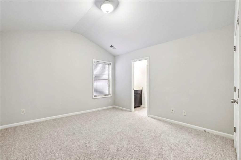 1210 Roswell Manor Circle Roswell, GA 30076 - Photo 30 of 43 an empty room with windows