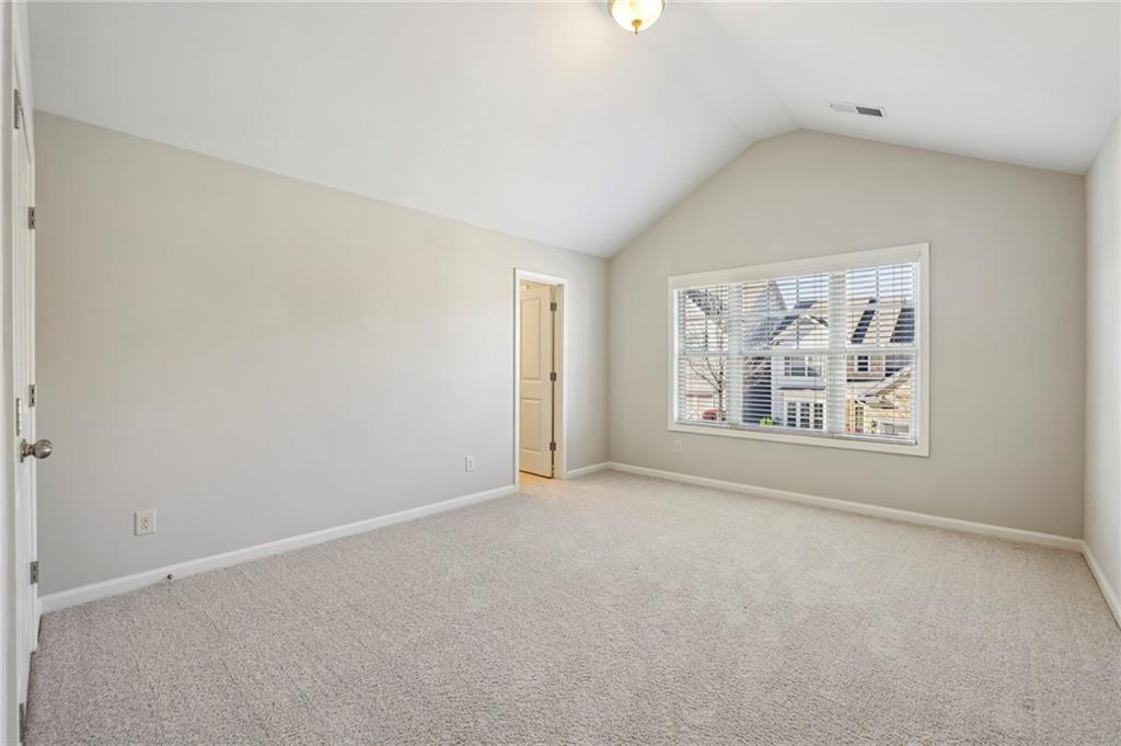 1210 Roswell Manor Circle Roswell, GA 30076 - Photo 33 of 43 an empty room with windows