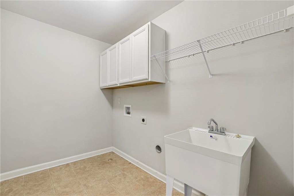 1210 Roswell Manor Circle Roswell, GA 30076 - Photo 36 of 43 a view of a sink and cabinets