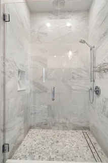 a view of a livingroom with workspace and a couch