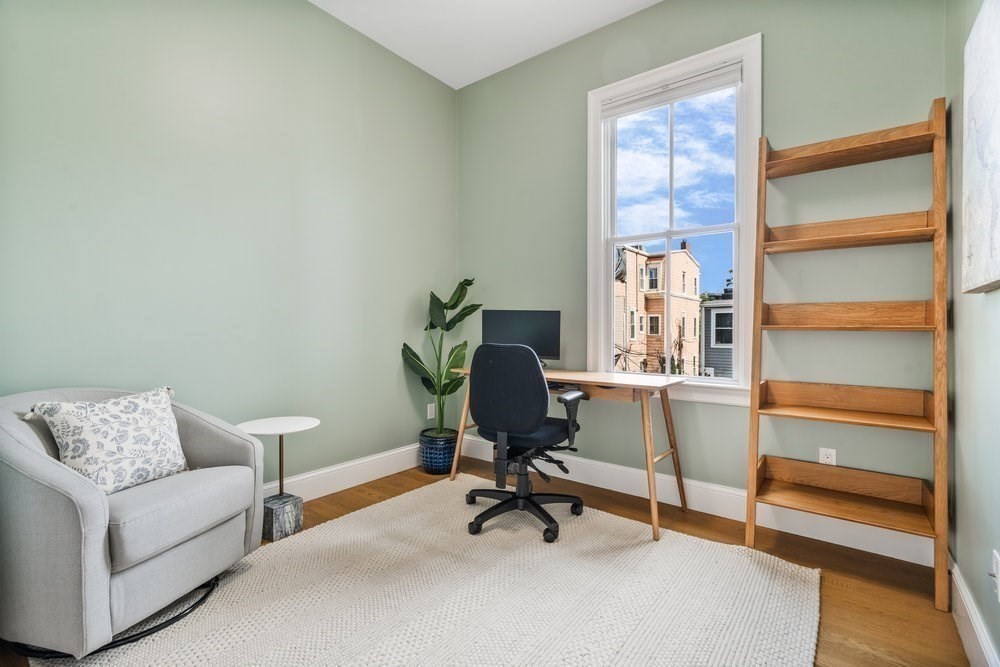 560 East 5th Street, Unit 2 Boston, MA 02127 - Photo 12 of 27 a view of a livingroom with workspace and a couch