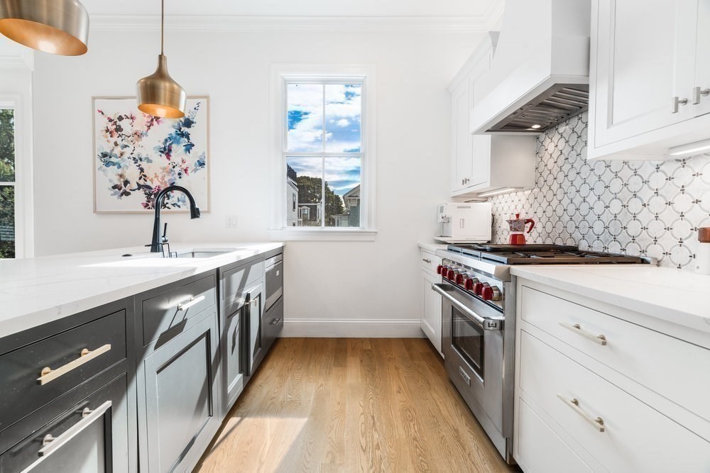 560 East 5th Street, Unit 2 Boston, MA 02127 - Photo 16 of 27 a kitchen with a sink stove and refrigerator