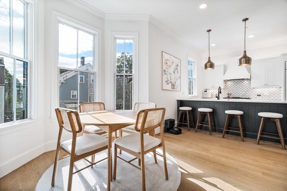 560 East 5th Street, Unit 2 Boston, MA 02127 - Photo 17 of 27 a dining room with furniture window wooden floor