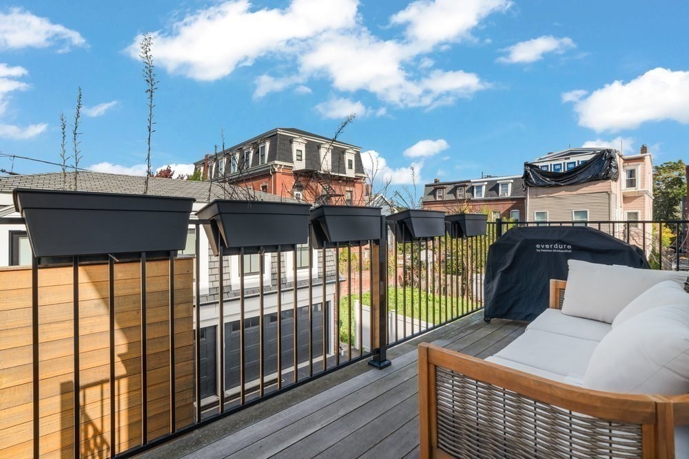 560 East 5th Street, Unit 2 Boston, MA 02127 - Photo 5 of 27 a view of a balcony with chairs