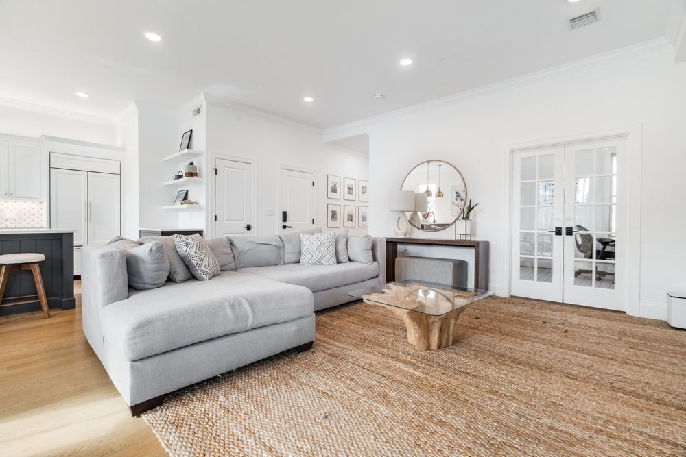 560 East 5th Street, Unit 2 Boston, MA 02127 - Photo 6 of 27 a living room with furniture a fireplace and a flat screen tv