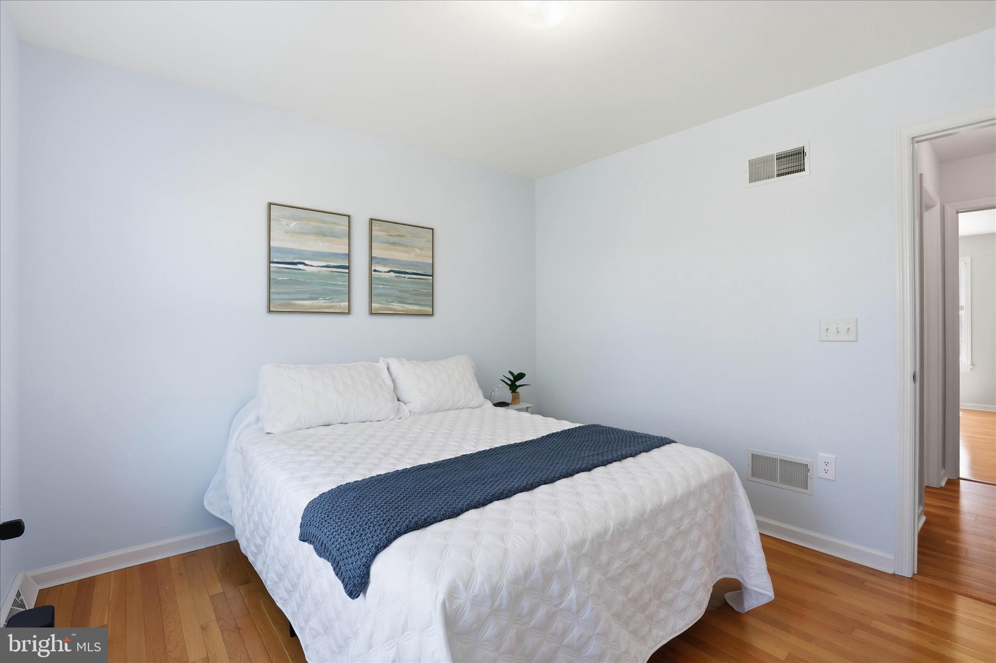 533 Thornberry Lane Lititz, PA 17543 - Photo 42 of 56 a bedroom with a bed and wooden floor