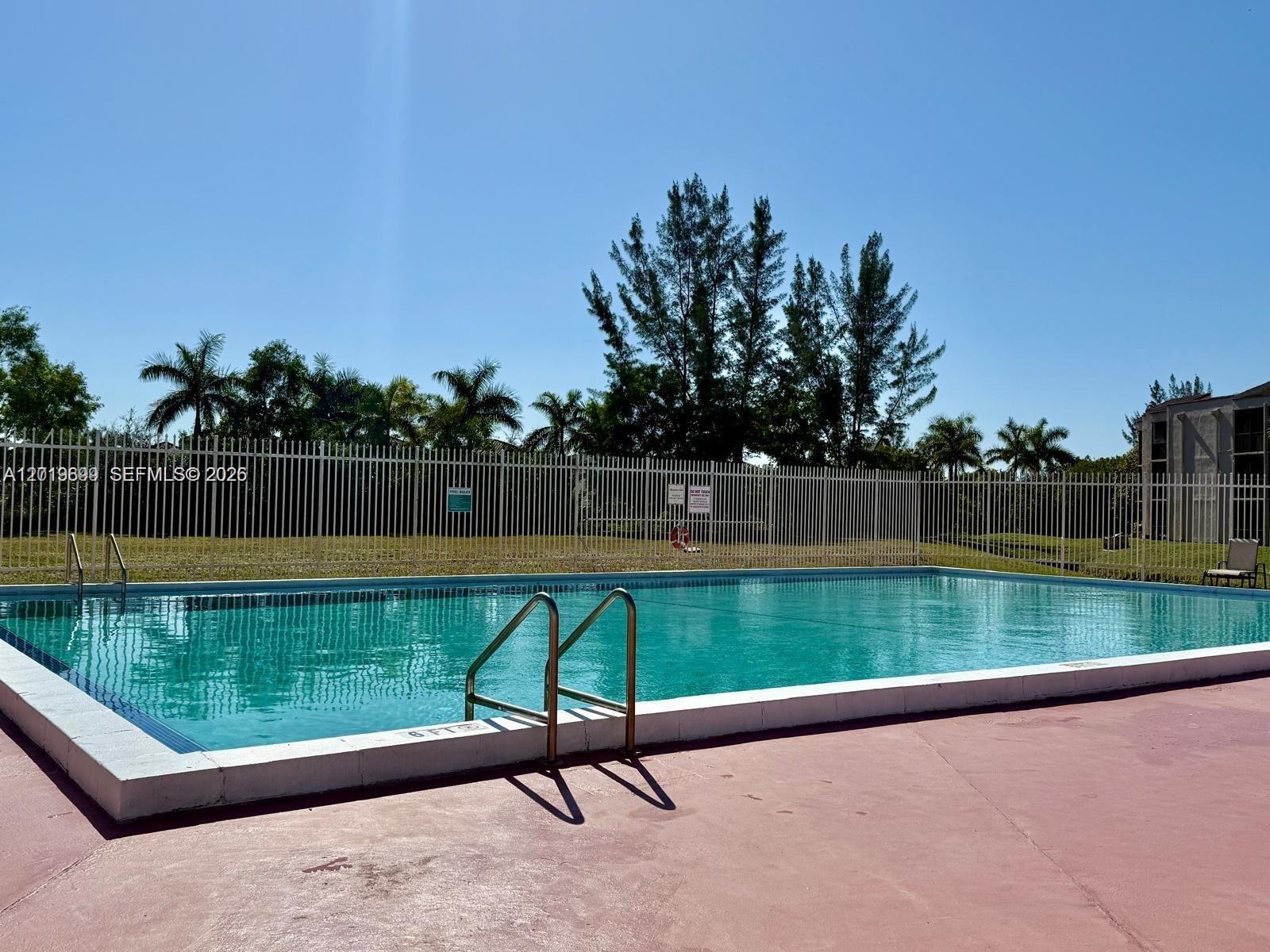 3470 Foxcroft Road, Unit 204 Miramar, FL 33025 - Photo 38 of 40 a view of park with lake view